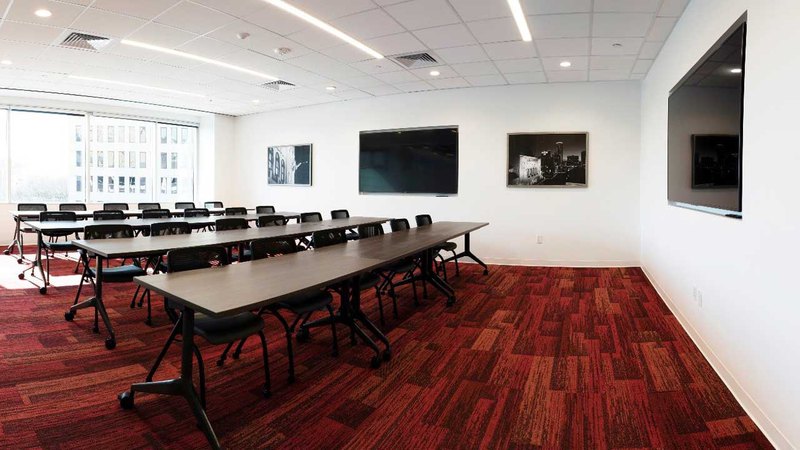 A big conference room, fully equipped for training.