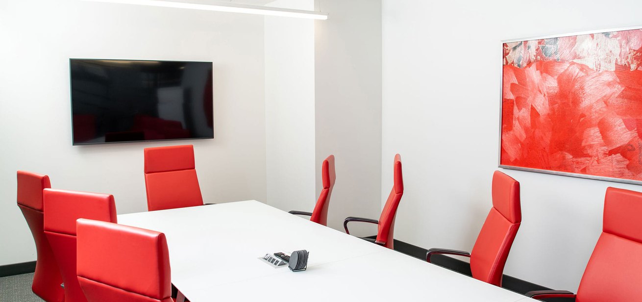 Fully furnished, white and red for-rent seminar room